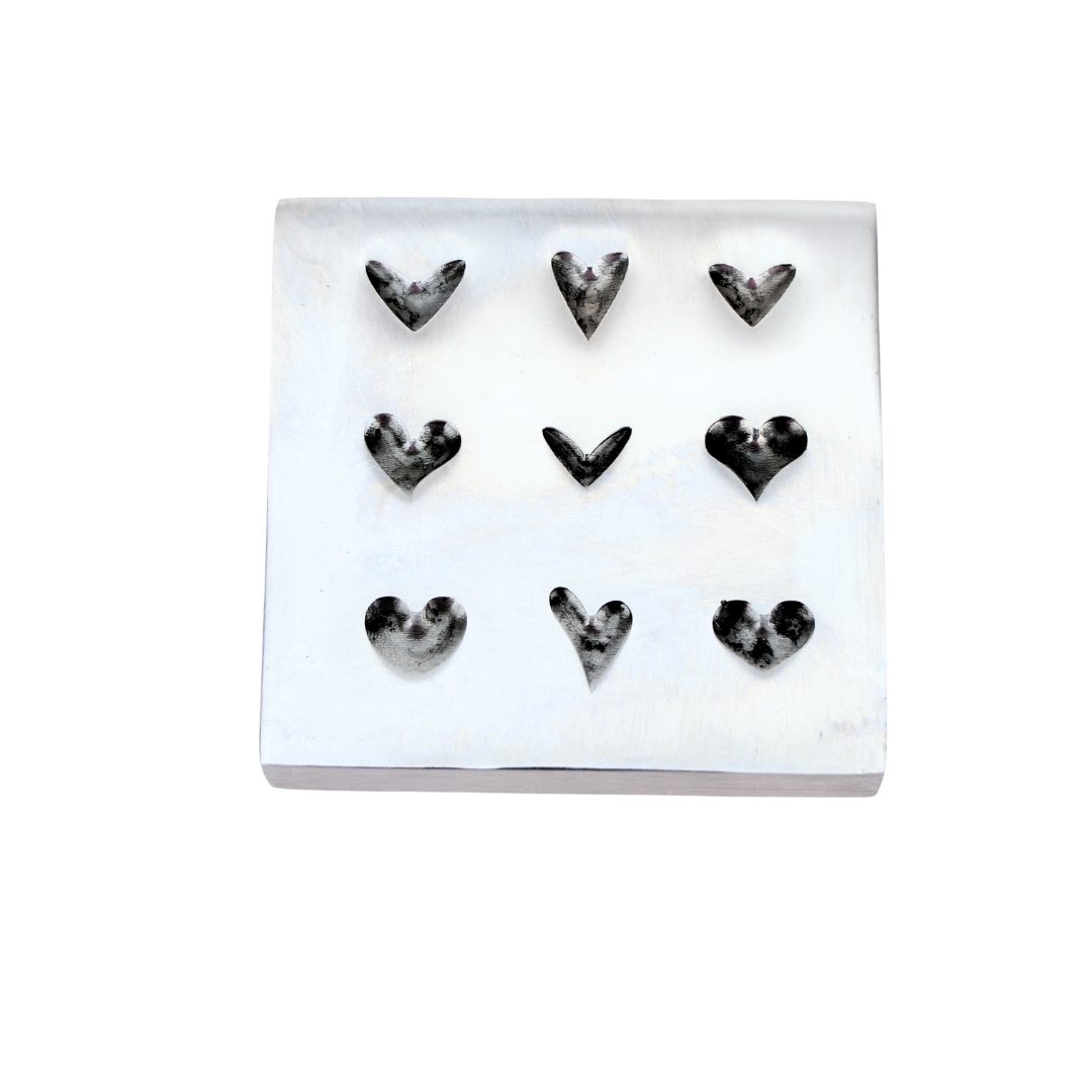 Heart-shaped impression dies shot plate with 9 unique heart designs for metal stamping and jewelry making