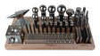 43-piece multi-purpose metal forming dapping set with block, anvil, swage, and punches on wooden tray for jewelry making and metalworking.