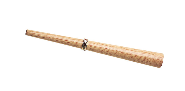 9-inch wooden ring holding and polishing mandrel with gold rings on white background